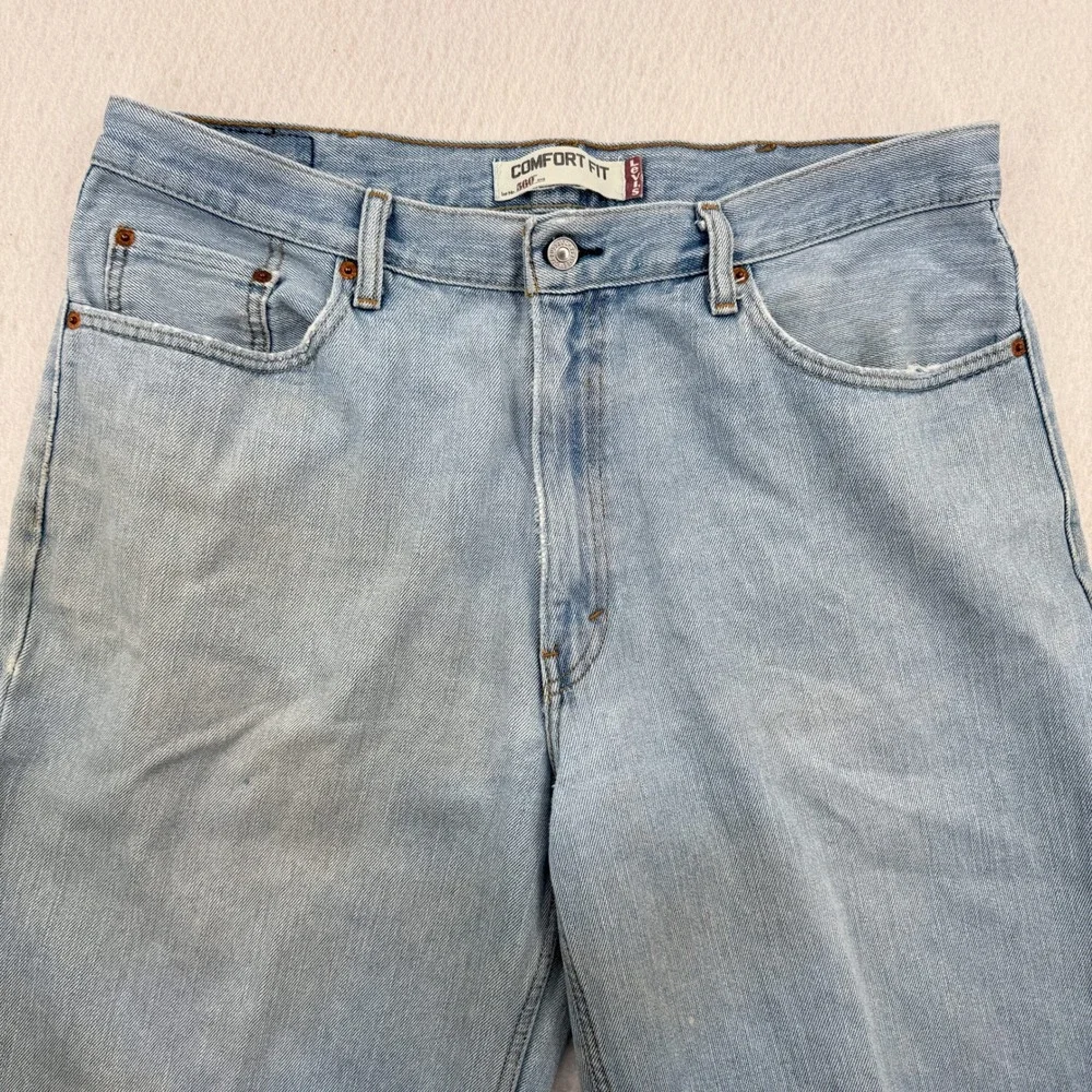 Levis 560 Comfort Fit Jeans Mens 38x30 Light Wash Blue Denim Tapered Leg Grunge